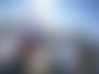 Painter Andrew Manaylo standing among horses, reflecting on 2026 – the Year of the Horse