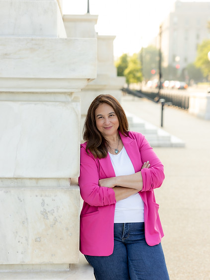 pink jacket arms folded full.jpg