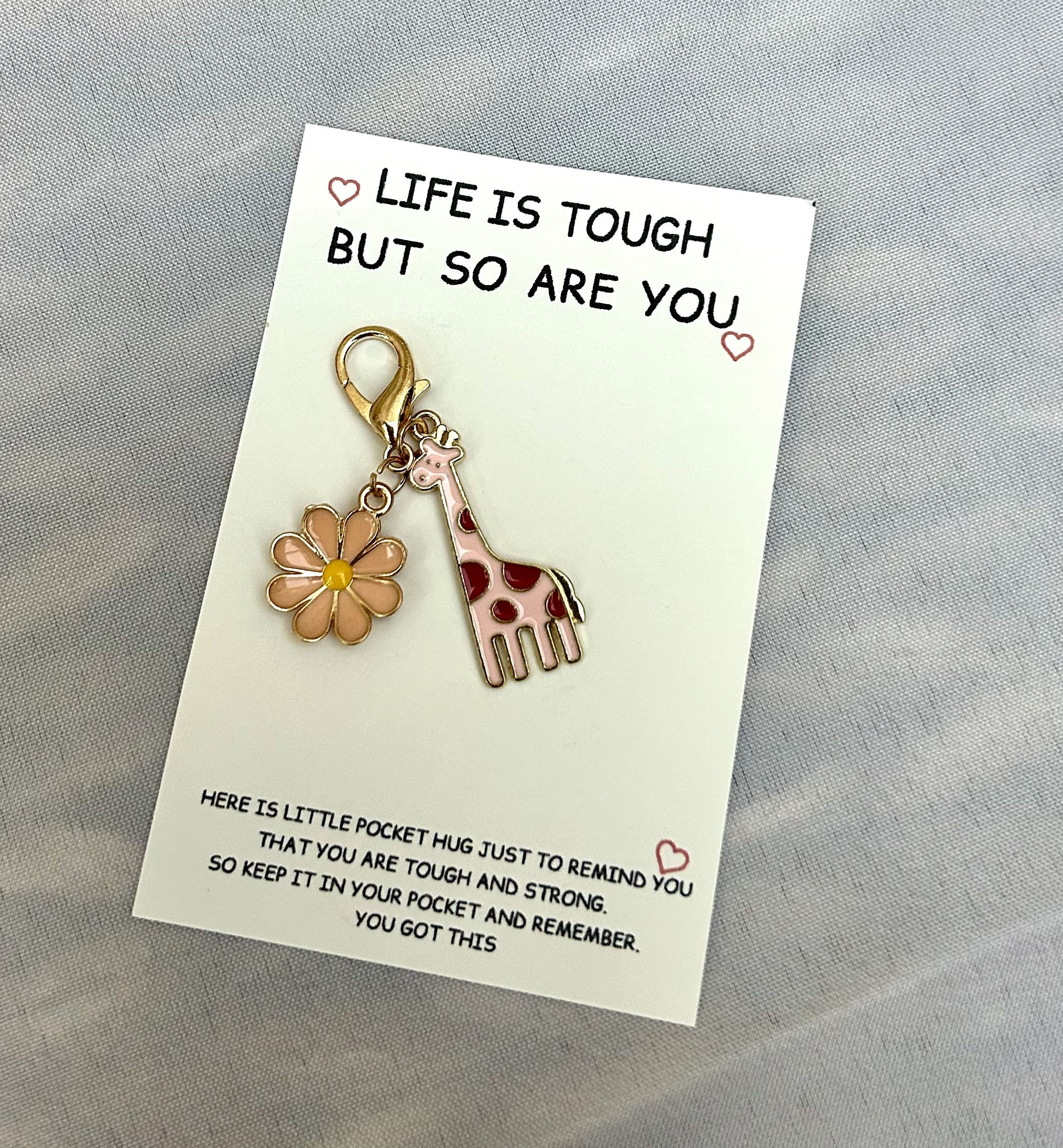 Pink giraffe Pocket Hug