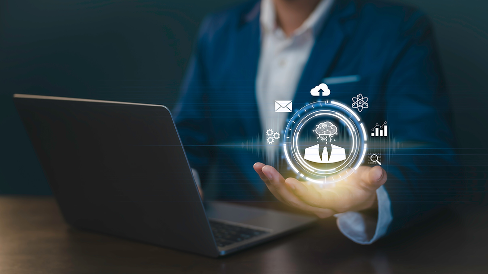 Businessperson in a blue suit holds a glowing digital interface icon above a laptop, with technology symbols floating, in a dark setting.