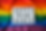 A rainbow flag background with Happy Pride Month on a text box on top