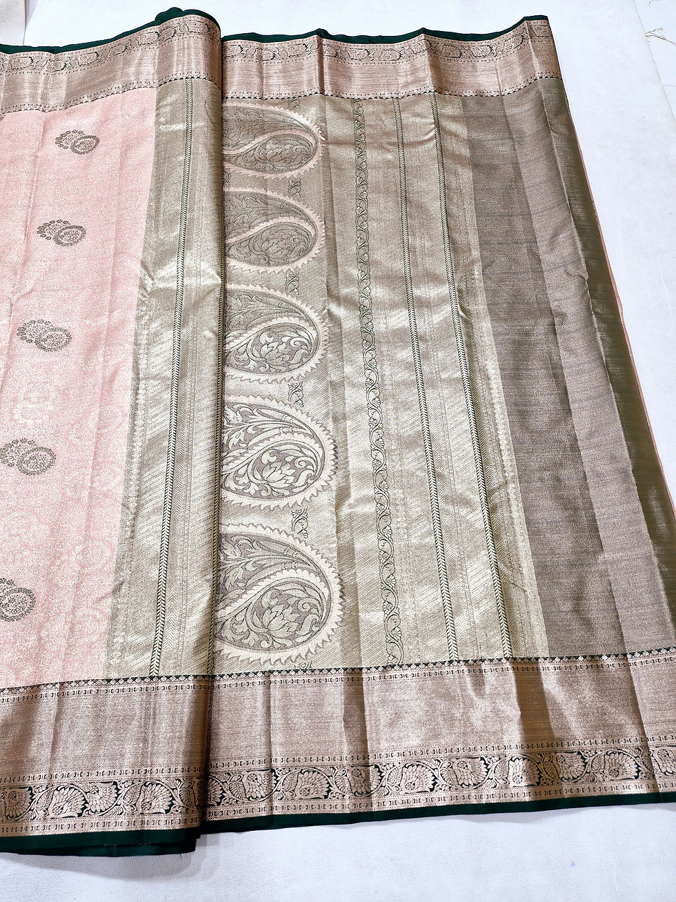Thumbnail: Green colour with light peach colour Kanchipuram pattu saree 
