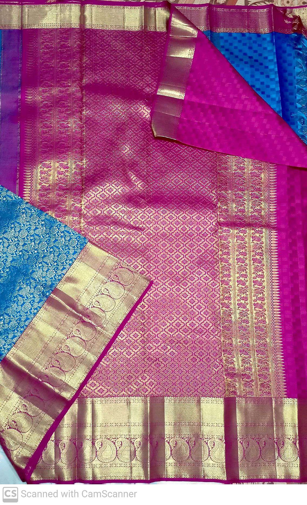 Thumbnail: Pink with cobalt blue juxtaposed with peacock motifs kanchipuram silk sarees