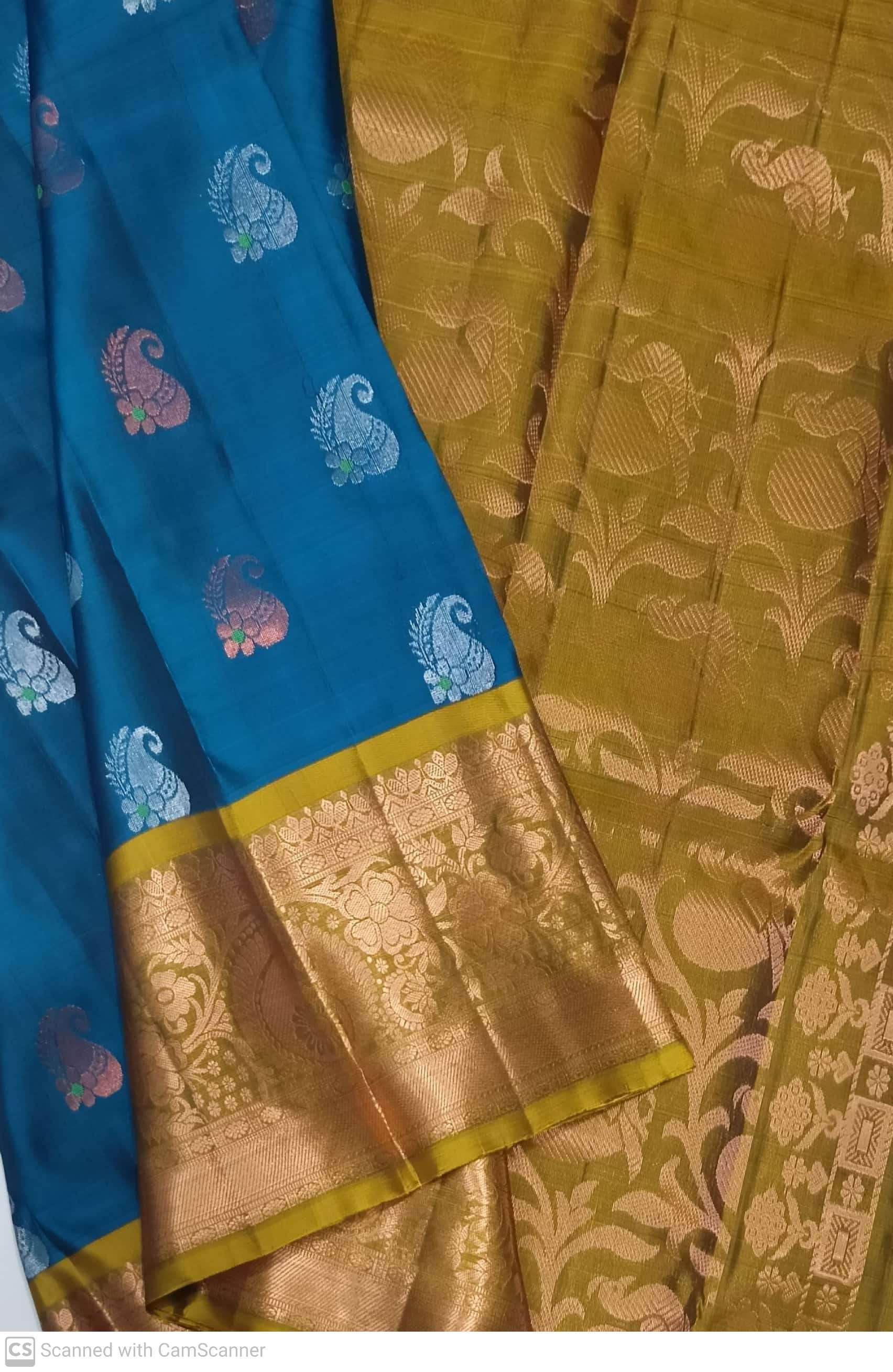 Golden mustard with peacock blue colour kanchipuram pure silk saree 