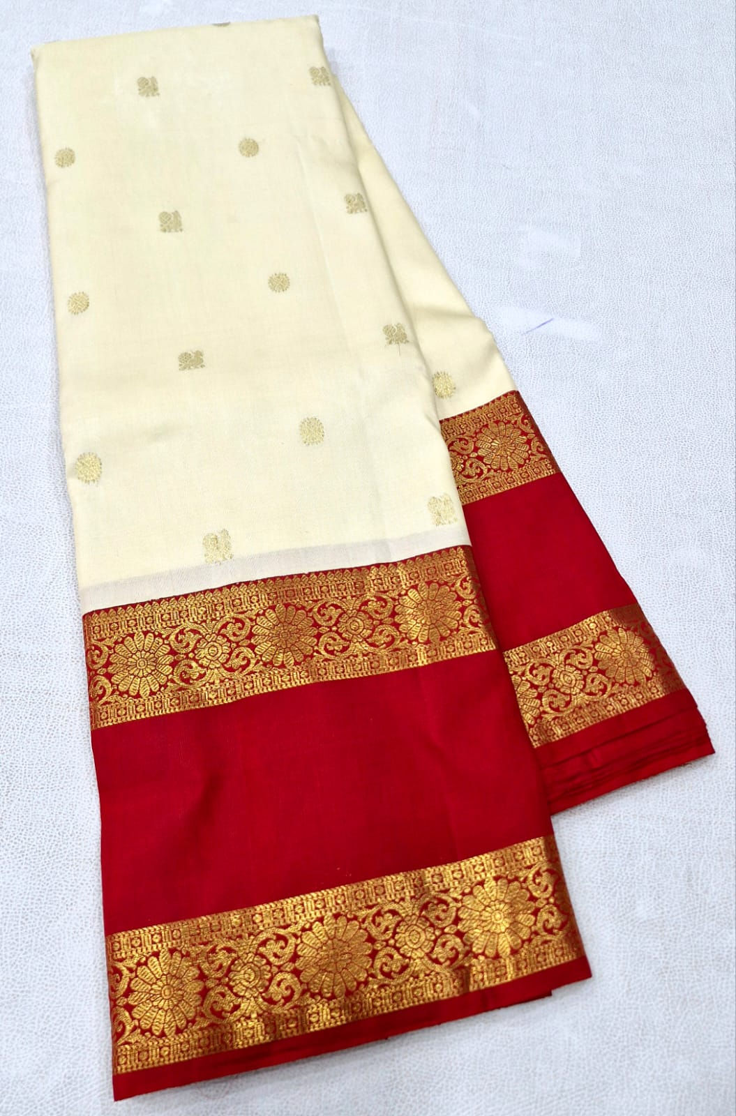 Red colour with cream colour Kanchipuram korvi design pure silk saree