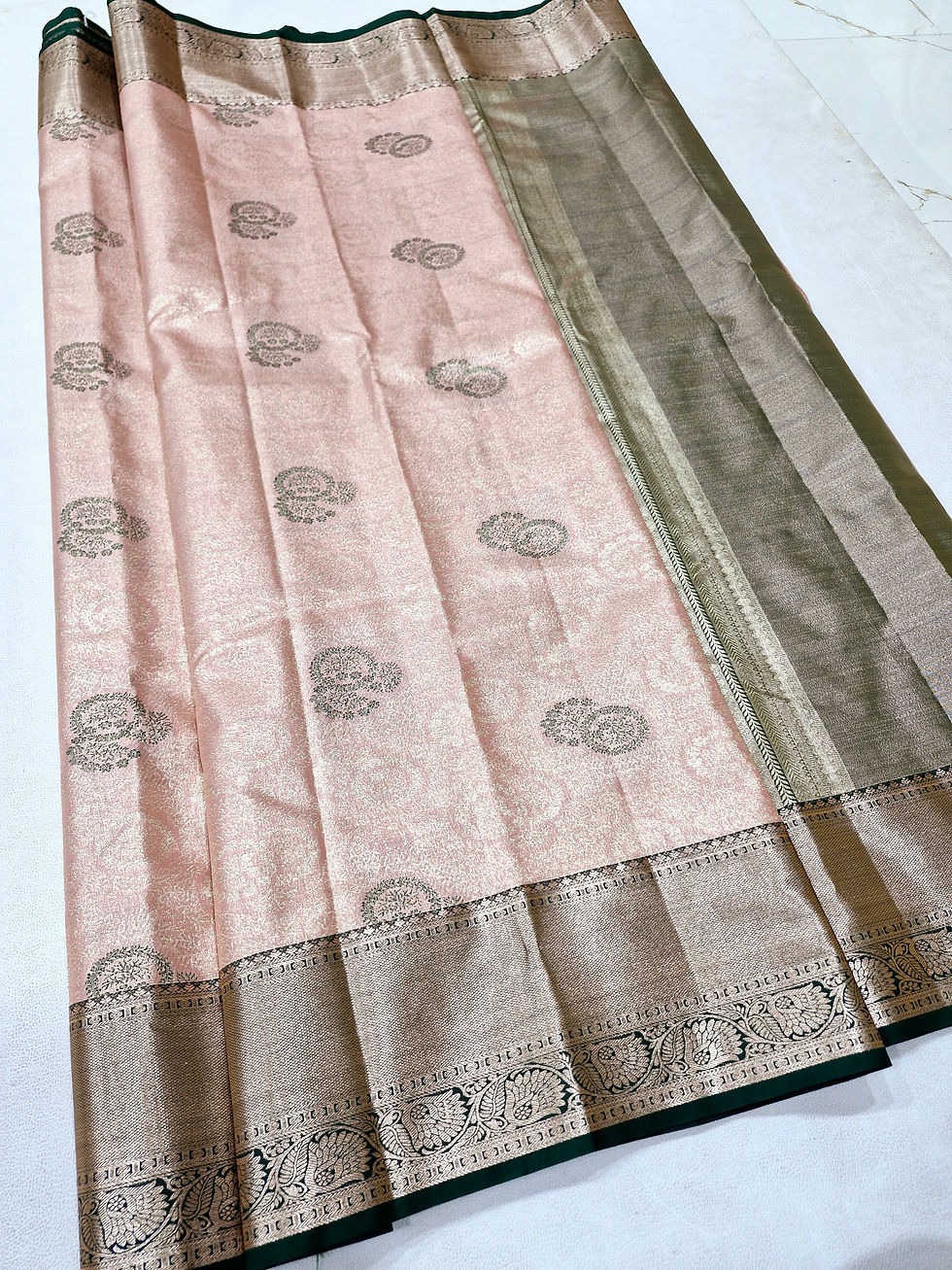 Thumbnail: Green colour with light peach colour Kanchipuram pattu saree 