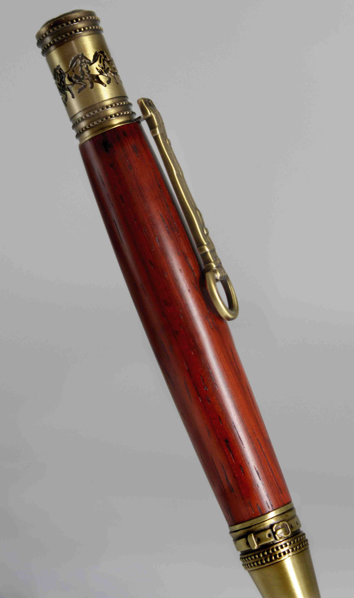 a close up of a wooden pen