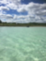 Clear Eagle lake with clouds above