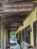 signs along a path of kitchens at Bohol Bee Farm