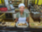 woman in front of spreads at Bohol Farm