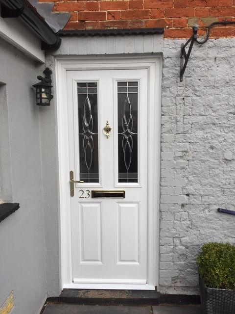 White composite front door with glass panels and letterbox