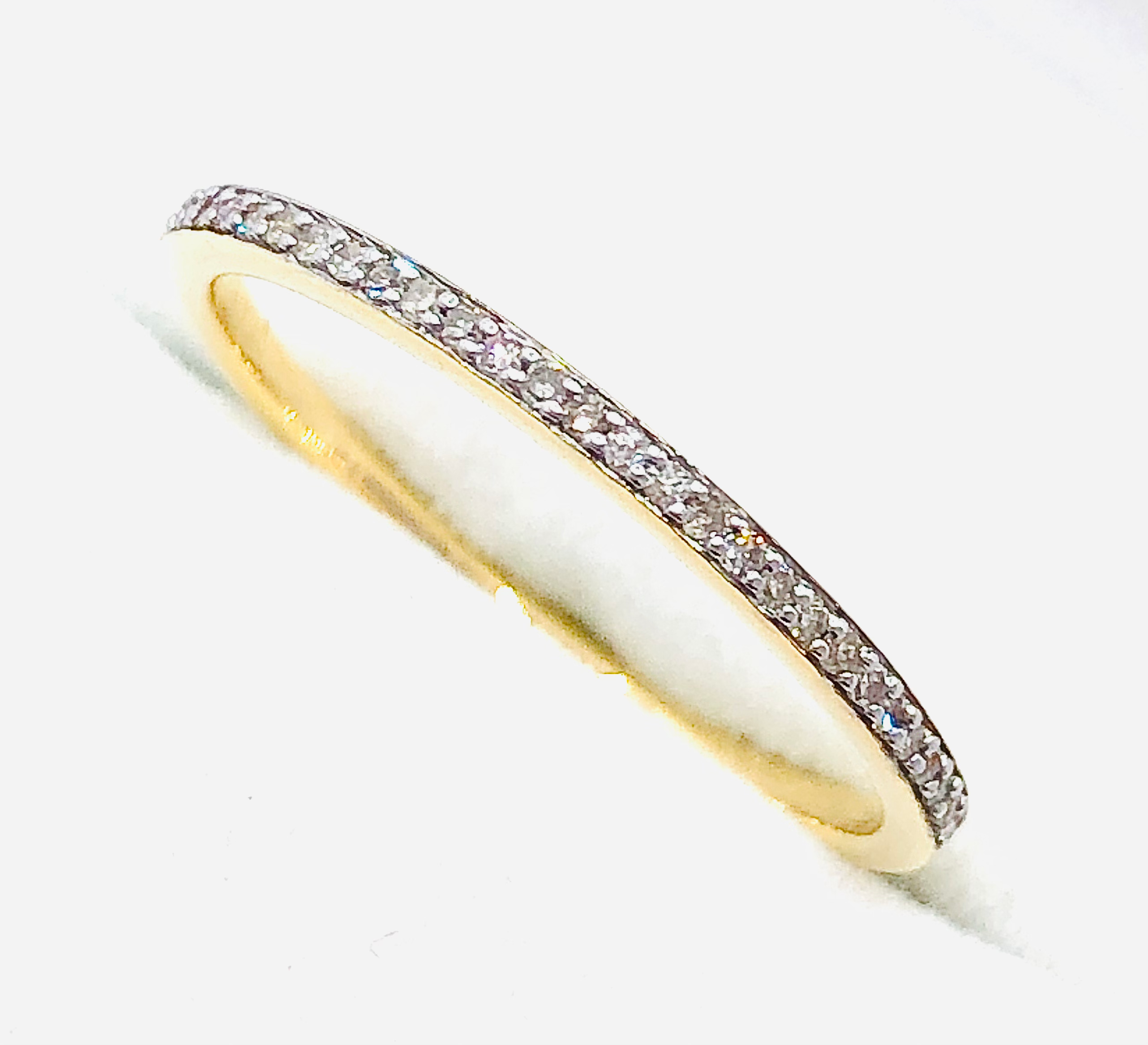 Sleek Micro-Prong Set Diamond Wedding Band in Gold