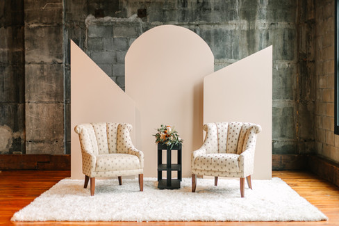 Wedding lounge set with backdrop and chairs