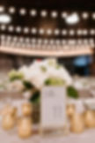 White and green wedding centerpiece candles with gold