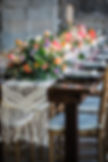 Spring blooms long table wedding centerpiece with Macrame runner