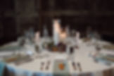 Candle centerpiece on wood block for round wedding table