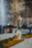 Wedding centerpiece round table cheesecloth runner dried flowers taper candle