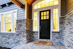 Revive Exteriors stone installation on house