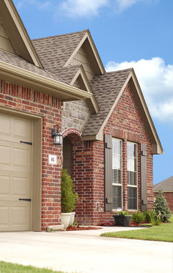 Revive Exteriors brick installation on house