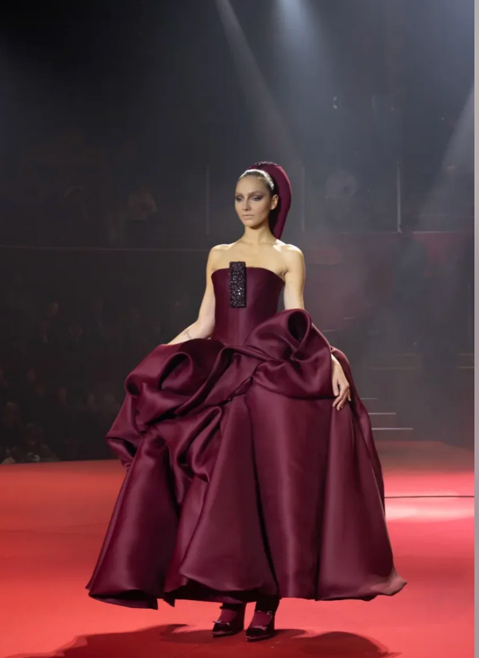 Teyana Taylor wears a dramatic burgundy Stéphane Rolland Spring 2026 Haute Couture ballgown at the 2026 BET Awards red carpet.