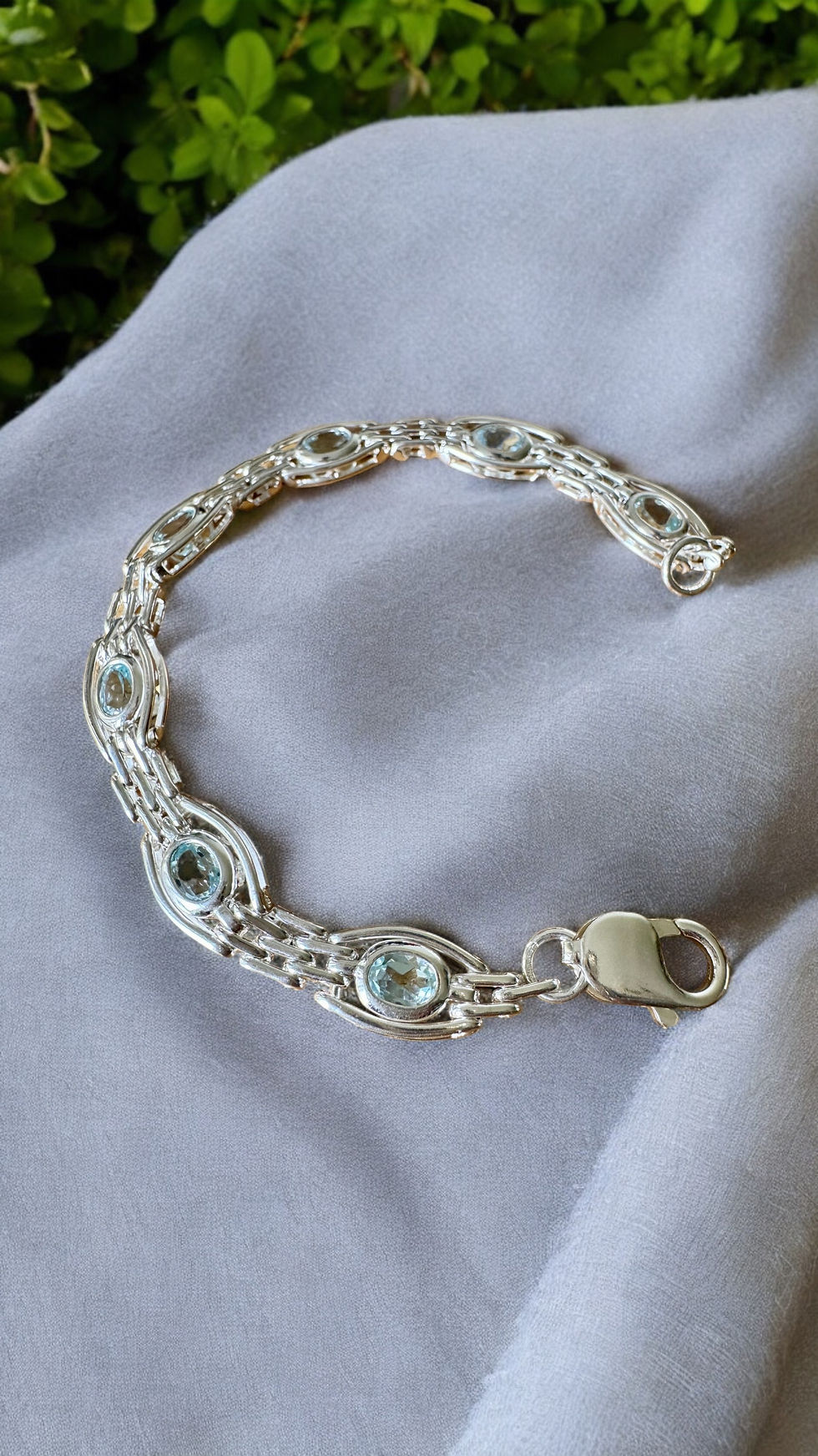 Thumbnail: Sterling Silver Handmade Gate Bracelet With Blue Topaz 