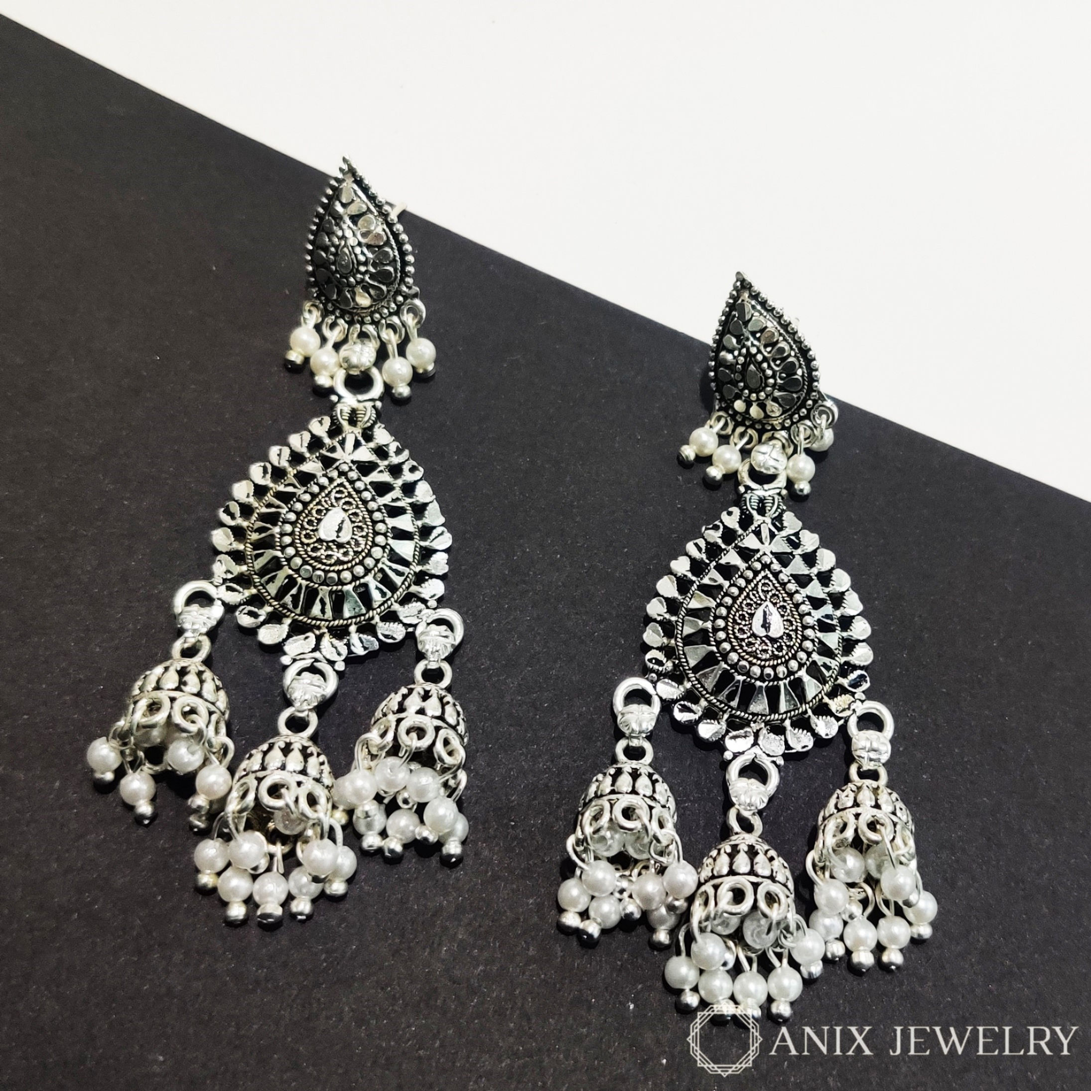 Silver oxidized 3 jhumka earring with white drops for women