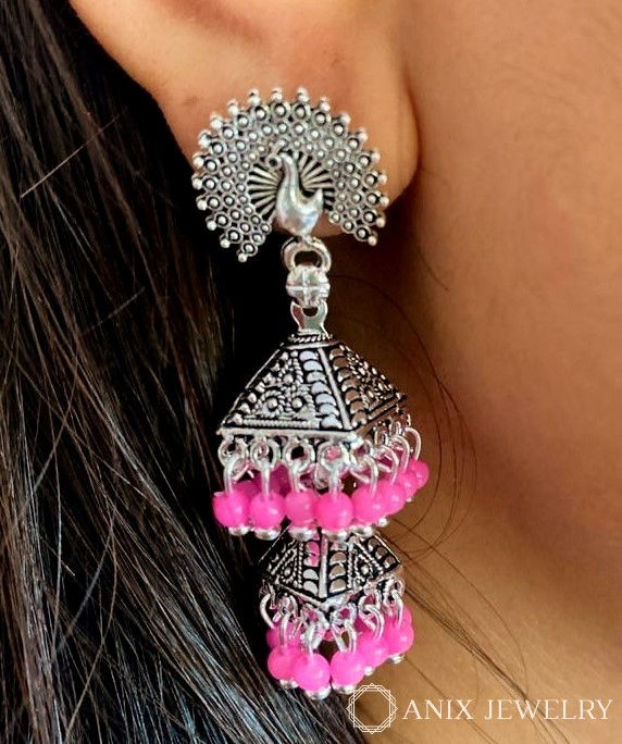 Thumbnail: Silver Oxidized peacock shaped earrings with pink,green and yellow drops