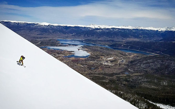 Snowboarding above town and Lake Dillon.