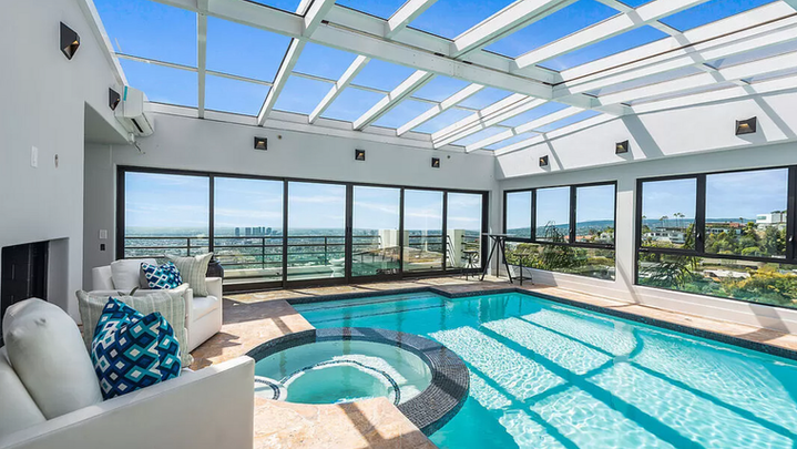 Top of Sunset Plaza, designed by interior designer Joseph Matthews. This stunning project encompasses the complete renovation of a 6,000 square foot home, including a lock-out attached one-bedroom apartment, and boasts incredible views from every angle. The design features coastal modern elegance with organic influences, making it a must-see showcase of meticulous design and craftsmanship