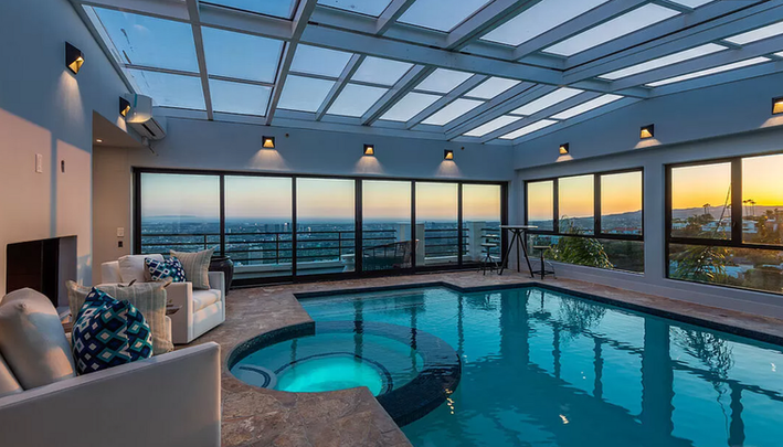 Top of Sunset Plaza, designed by interior designer Joseph Matthews. This stunning project encompasses the complete renovation of a 6,000 square foot home, including a lock-out attached one-bedroom apartment, and boasts incredible views from every angle. The design features coastal modern elegance with organic influences, making it a must-see showcase of meticulous design and craftsmanship