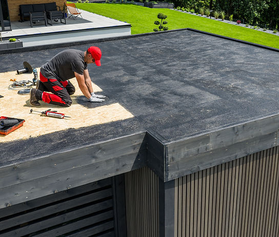 worker-installing-epdm-roofing-material-on-a-resid-2026-03-25-07-26-53-utc.jpg
