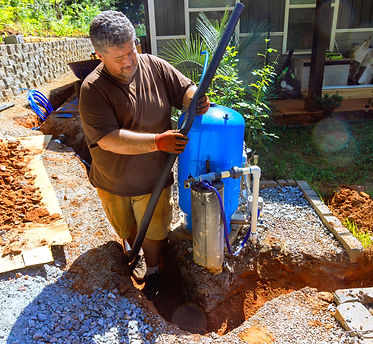 man-installing-water-well-pump-in-garden-during-wo-2026-01-08-23-34-42-utc.jpg