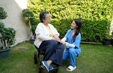 caregiver-helps-an-elderly-woman-in-a-garden-durin-2026-01-12-01-44-15-utc_11zon.jpg