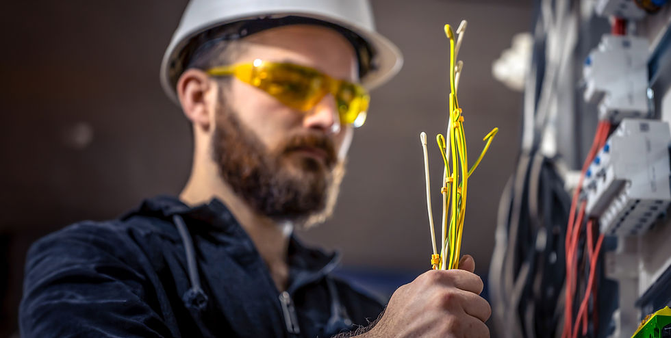 male-electrician-electrical-technician-working-switchboard.jpg