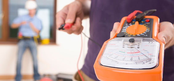 a-close-up-of-an-electrician-holding-a-voltmeter-2026-03-26-05-03-37-utc.jpg