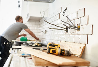 electrician-working-on-kitchen-tile-installation-2026-03-25-03-55-59-utc.jpg
