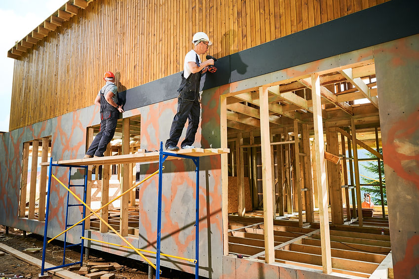 construction-workers-building-new-wooden-house-fra-2026-01-07-01-02-28-utc.jpg