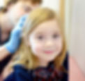 doctor-examines-child-hair-and-scalp-for-lice-and-2025-02-22-19-33-03-utc_edited.jpg