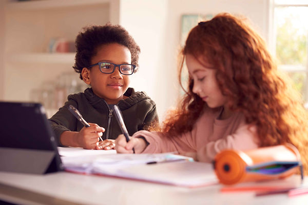 children-studying-together-at-home-at-table-2026-03-10-03-17-50-utc_11zon.jpg