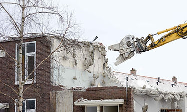 demolition-of-building-with-excavator-in-urban-are-2026-01-07-00-37-28-utc_11zon.jpg