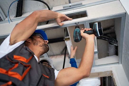 low-angle-people-working-with-drill.jpg