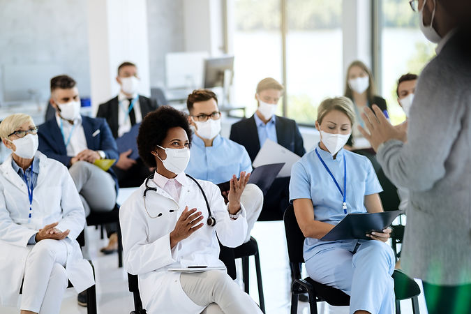 medical-staff-attending-a-meeting-wearing-face-mas-2026-09-21-11-34-43-utc.jpg
