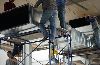 workers-are-helping-to-raise-the-cool-air-duct-of-2026-03-10-02-10-55-utc.jpg
