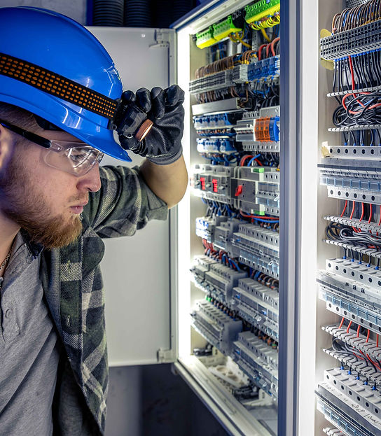 a-male-electrician-works-in-a-switchboard-in-overa-2026-03-24-04-05-58-utc_11zon.jpg