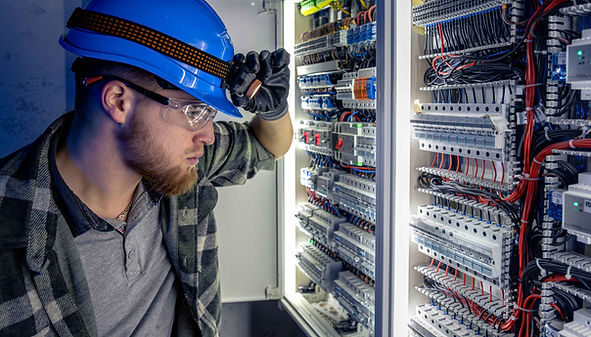 a-male-electrician-works-in-a-switchboard-in-overa-2026-03-24-04-05-58-utc_11zon.jpg