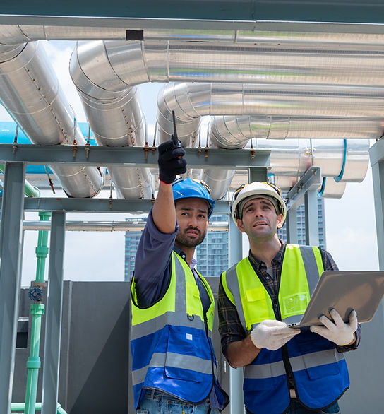 engineers-inspecting-cooling-system-on-building-ro-2026-03-19-22-42-03-utc.JPG