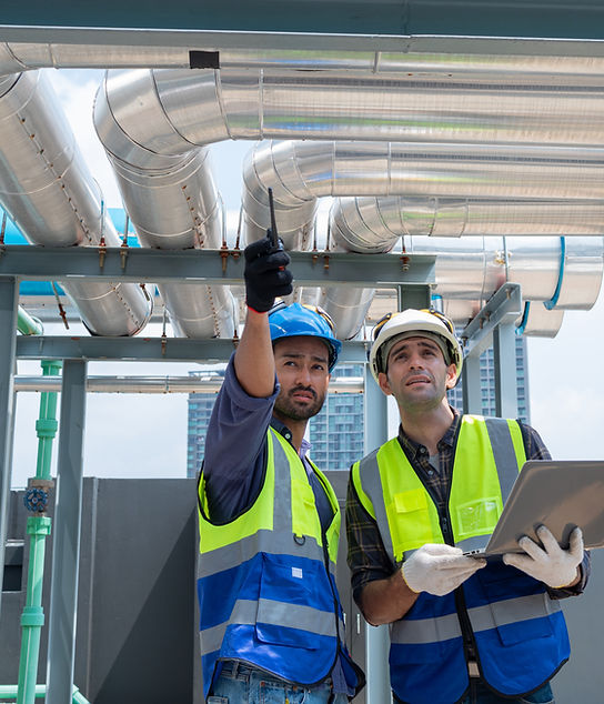 engineers-inspecting-cooling-system-on-building-ro-2026-03-19-22-42-03-utc.JPG