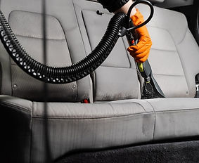 car-dry-cleaner-is-using-extraction-machine-removing-stains-dirt-from-textile-seats-closeu