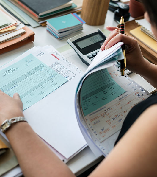 woman-reviews-financial-paperwork-in-an-office-set-2026-09-15-20-19-52-utc.jpg