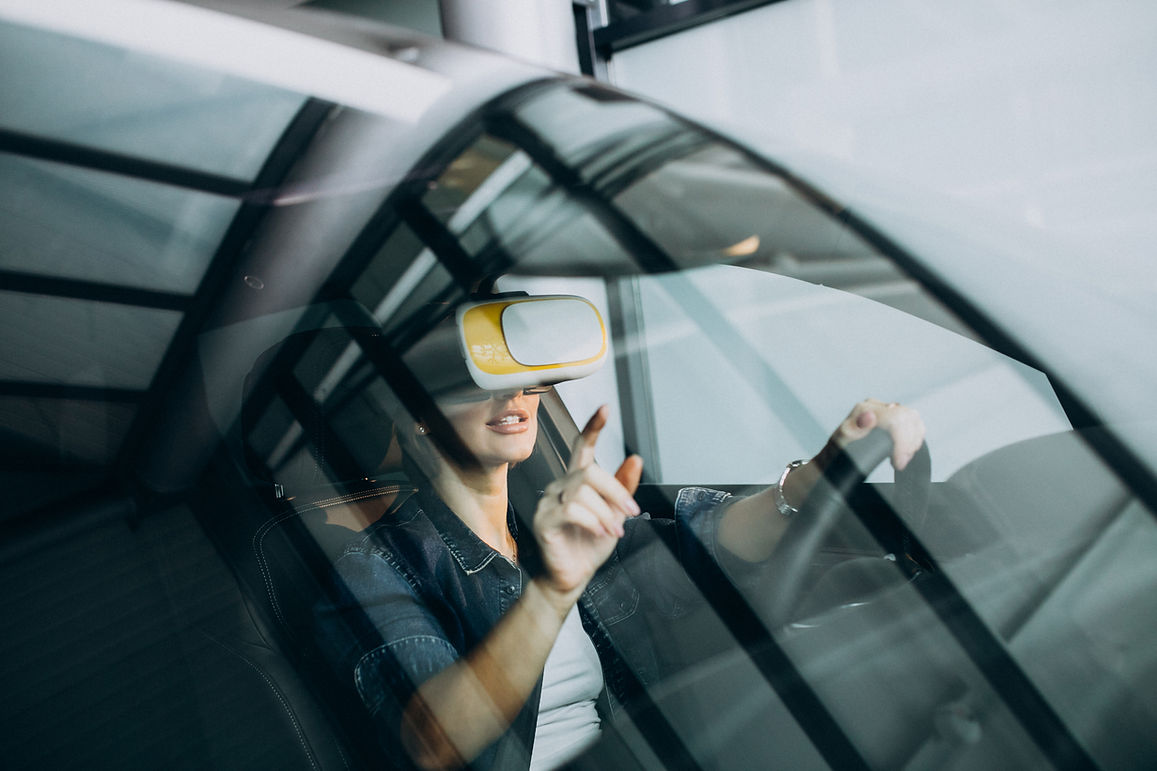 woman-sitting-inside-car-wearing-vr-glasses.jpg